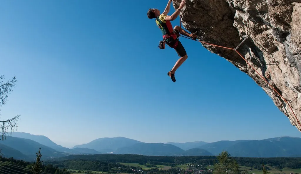 A person is climbing a rock