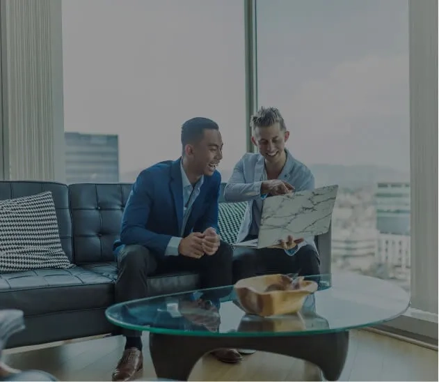 two persons discussing services