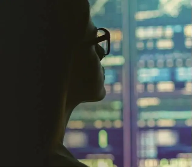 A person is looking at the window