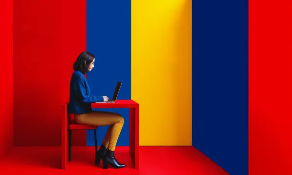 A woman is designing content and search strategy in a small room
