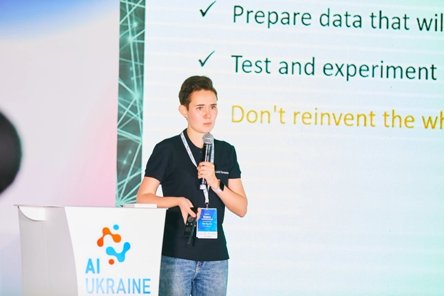 Speaker presenting at the AI Ukraine conference.