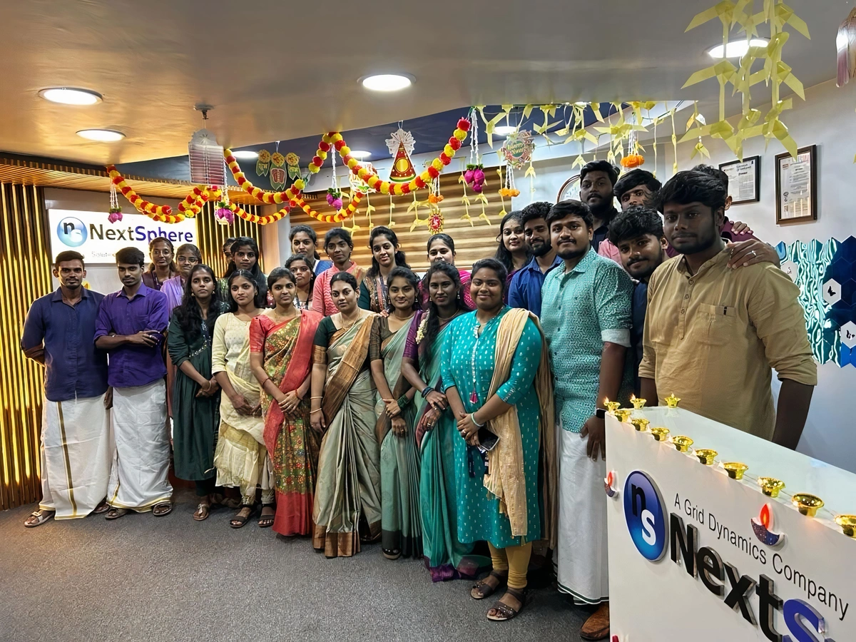 Employees in traditional attire during a festive celebration.