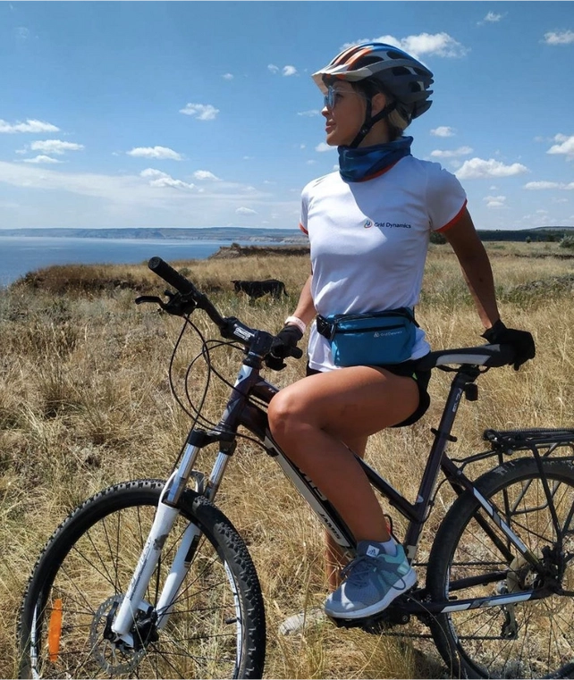 Lady on the bicycle, appreciating the view