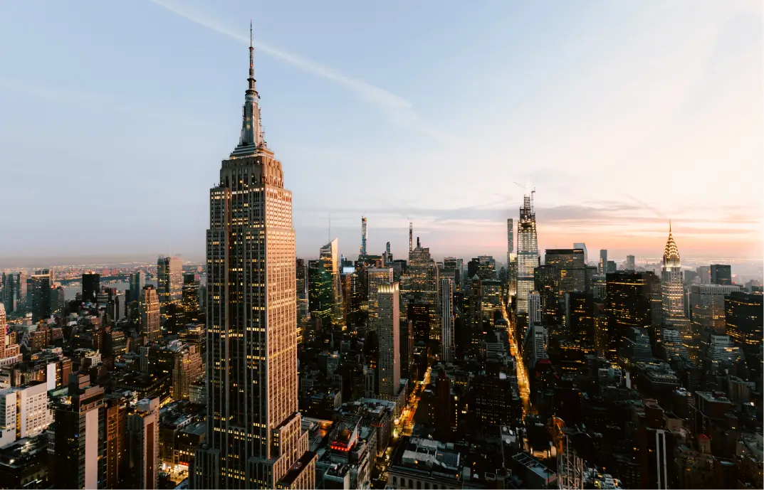 City skyline with skyscrapers and floating golden coins, symbolizing financial growth